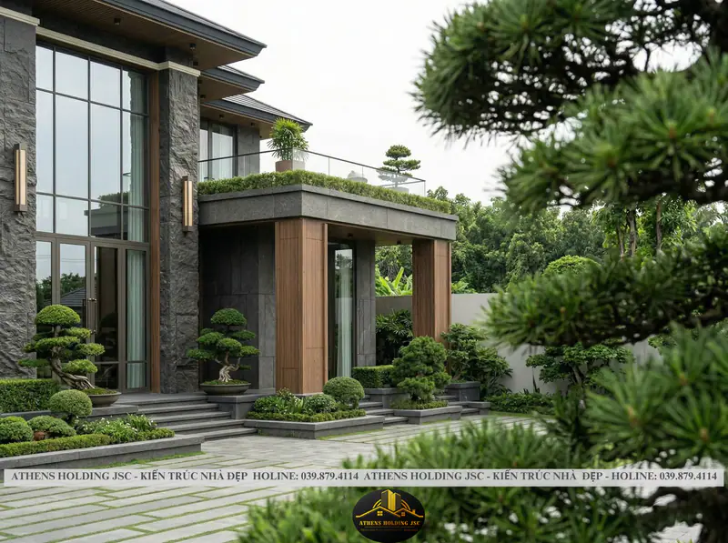 Cột đá và cây bonsai trước sảnh