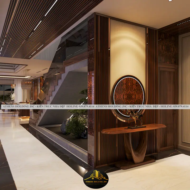 Sảnh với bàn console và gương tròn bên giếng trời