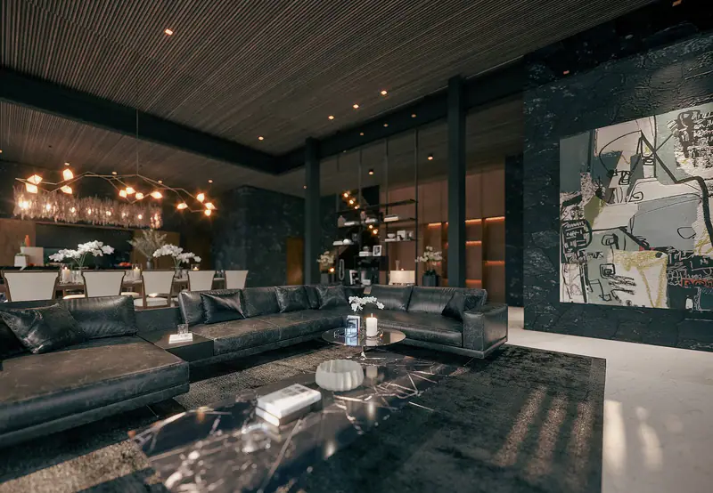 Sofa góc và bàn đá đen dưới dãy đèn thả
