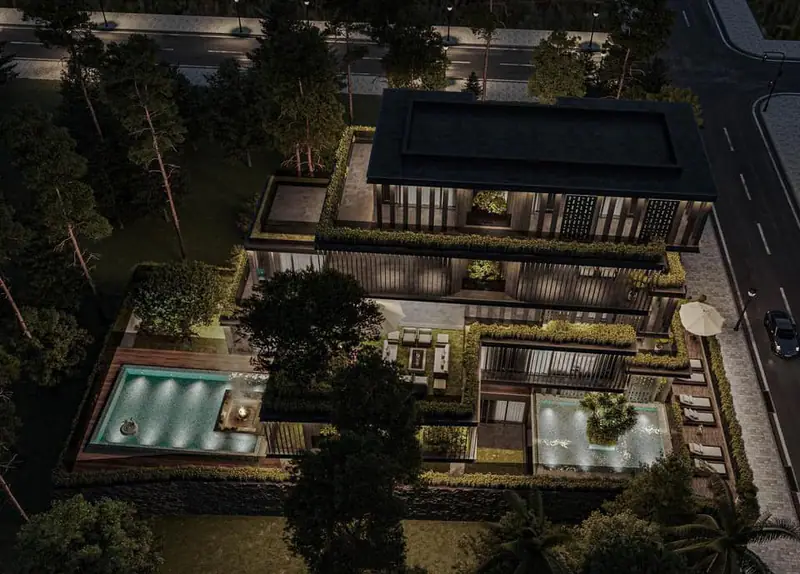 Toàn cảnh khu villa với hồ bơi và sân vườn về đêm